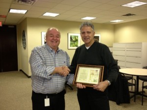 Starbucks presents UmbrellaOne award for building maintenance services